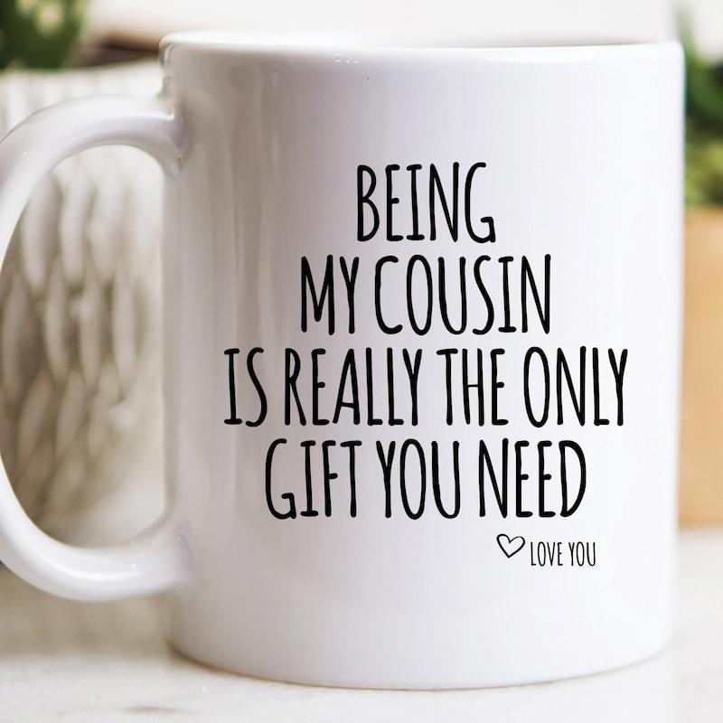 Tailorly White Ceramic 11 oz Mug - Being My Cousin Is Really The Only Gift You Need Love You Minimalist Ceramic Surface With Simple Black Lettering And Small Heart