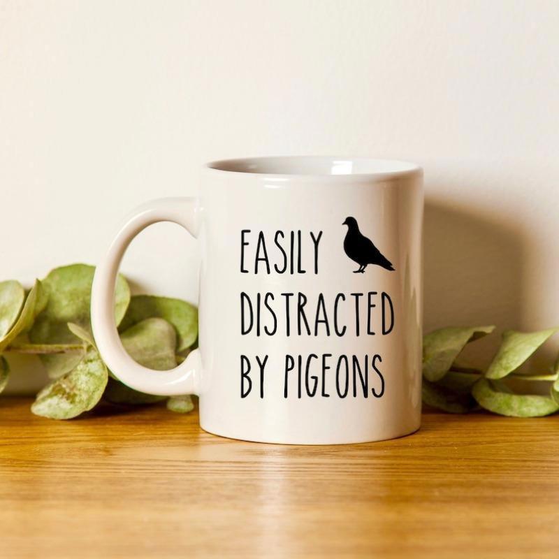 Tailorly White Ceramic 11 oz Mug - Easily Distracted By Pigeons Minimalist Black Silhouette Bird Sitting Calmly Next To Humorous Quote Pigeon
