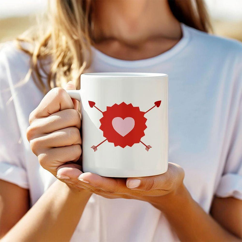 Tailorly White Ceramic 11 oz Mug - Elegant Red Serrated Badge Featuring A Pink Center And Crossed Arrows Heart