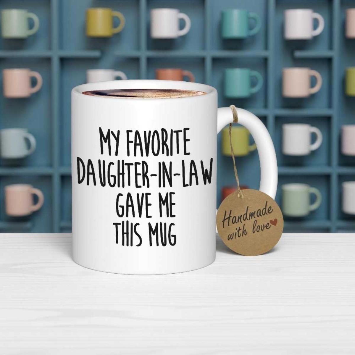 Tailorly White Ceramic 11 oz Mug - My Favorite Daughter In Law Gave Me This Mug Handmade With Love Minimalist White Ceramic Displayed On A Rustic Light Wooden
