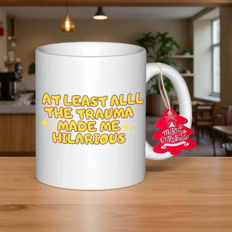 Tailorly White Ceramic 11 oz Mug - At Least Alll The Trauma Made Me Hilarious Simple With Yellow Playful Bubbly Rounded Letters Mug