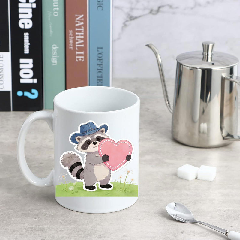 Tailorly White Ceramic 11 oz Mug - Adorable Cartoon Raccoon Wearing Cowboy Hat Holding Large Pink Heart Standing Raccoon