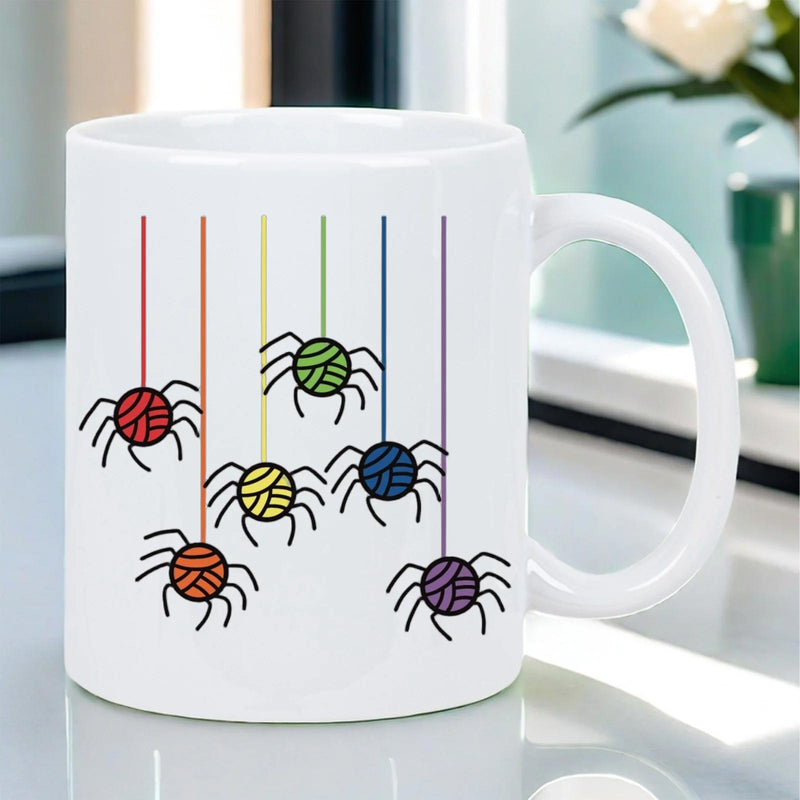 Tailorly White Ceramic 11 oz Mug - Colorful Yarn Balls Hanging From Threads With Multiple Playful Legs Spider