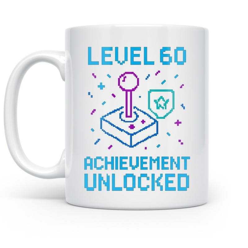Tailorly White Ceramic 11 oz Mug - Level 60 Achievement Unlocked Retro Pixel Art Styled Graphics Featuring Star Elements And Gaming Joystick