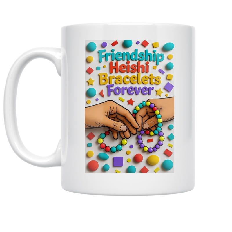 Tailorly White Ceramic 11 oz Mug - Friendship Heishi Bracelets Forever Two Hands Holding Colorful Handmade Bead Bracelets Among Scattered Vibrant Shapes Bracelet