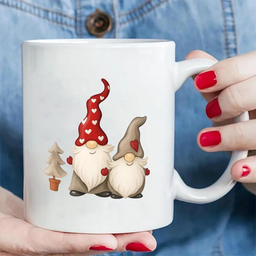 Tailorly White Ceramic 11 oz Mug - Two Festive Christmas Gnomes Wearing Heart Patterned Hats Beside Small Potted Gnomes