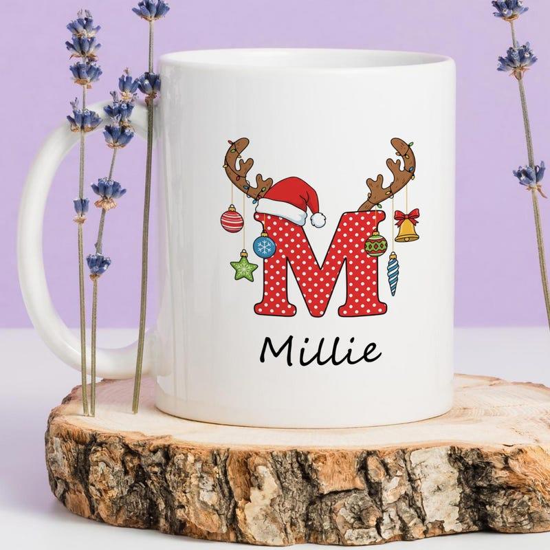 Tailorly White Ceramic 11 oz Mug - Millie Polka Dot Red Letter Featuring Reindeer Antlers And Holiday Hat Initial