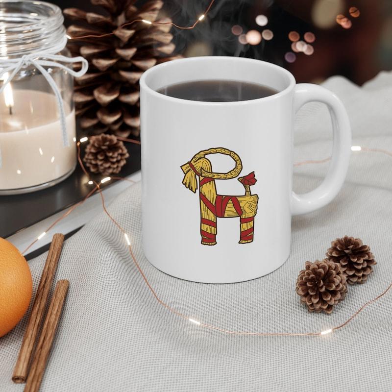 Tailorly White Ceramic 11 oz Mug - Traditional Scandinavian Christmas Straw Design With Festive Red Ribbons Symbolizing Nordic Yule Goat