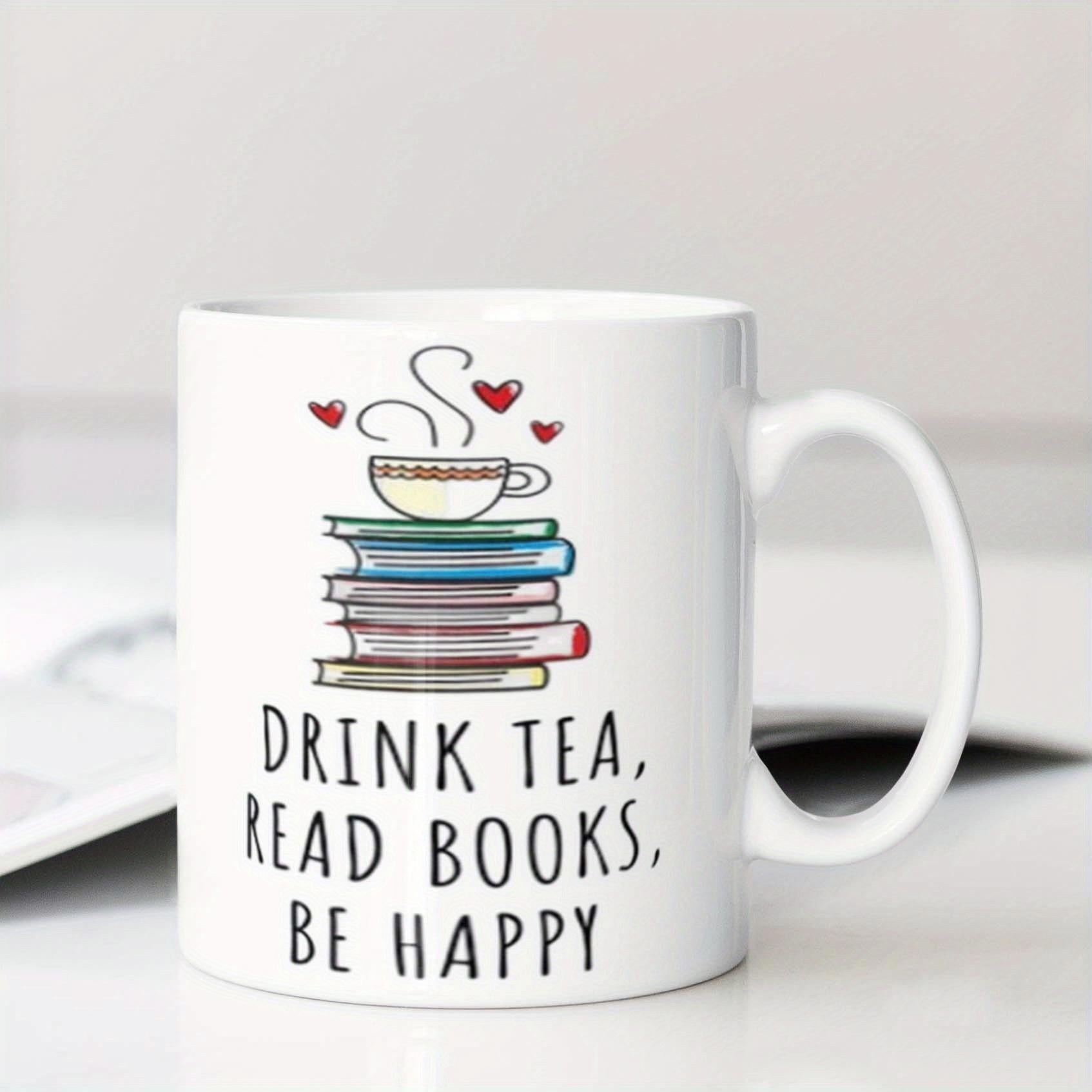 Tailorly White Ceramic 11 oz Mug - Drink Tea Read Books Be Happy Colorful Stacked Hardcover Volumes Supporting A Steaming Hot Cup Under Floating Hearts Books