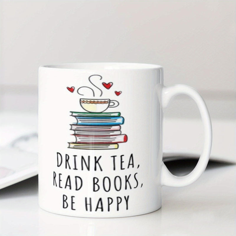 Tailorly White Ceramic 11 oz Mug - Drink Tea Read Books Be Happy Colorful Stacked Hardcover Volumes Supporting A Steaming Hot Cup Under Floating Hearts Books
