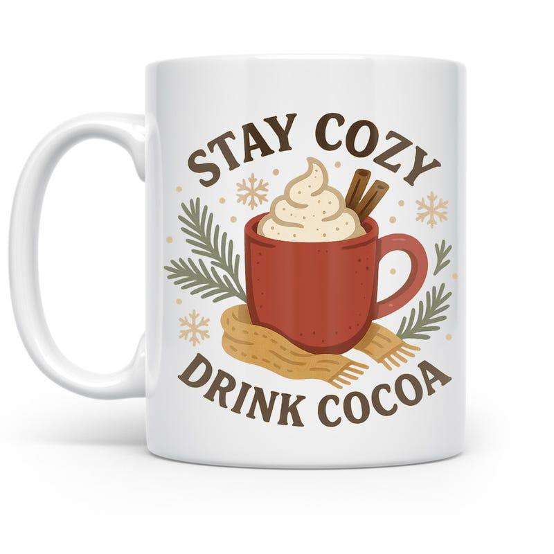 Tailorly White Ceramic 11 oz Mug - Stay Cozy Drink Cocoa Warm Red Cup With Whipped Cream And Cinnamon Resting On Scarf Mug