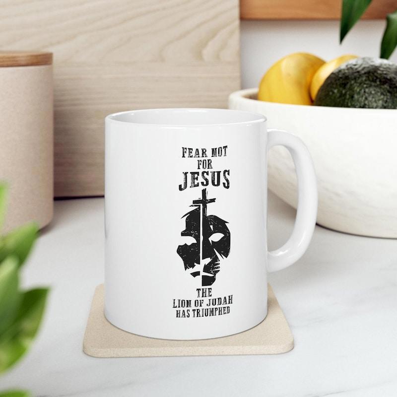 Tailorly White Ceramic 11 oz Mug - Fear Not For Jesus The Lion Of Judah Has Triumphed Stylized Black Ink Print Featuring A Majestic Roaring Predator Face