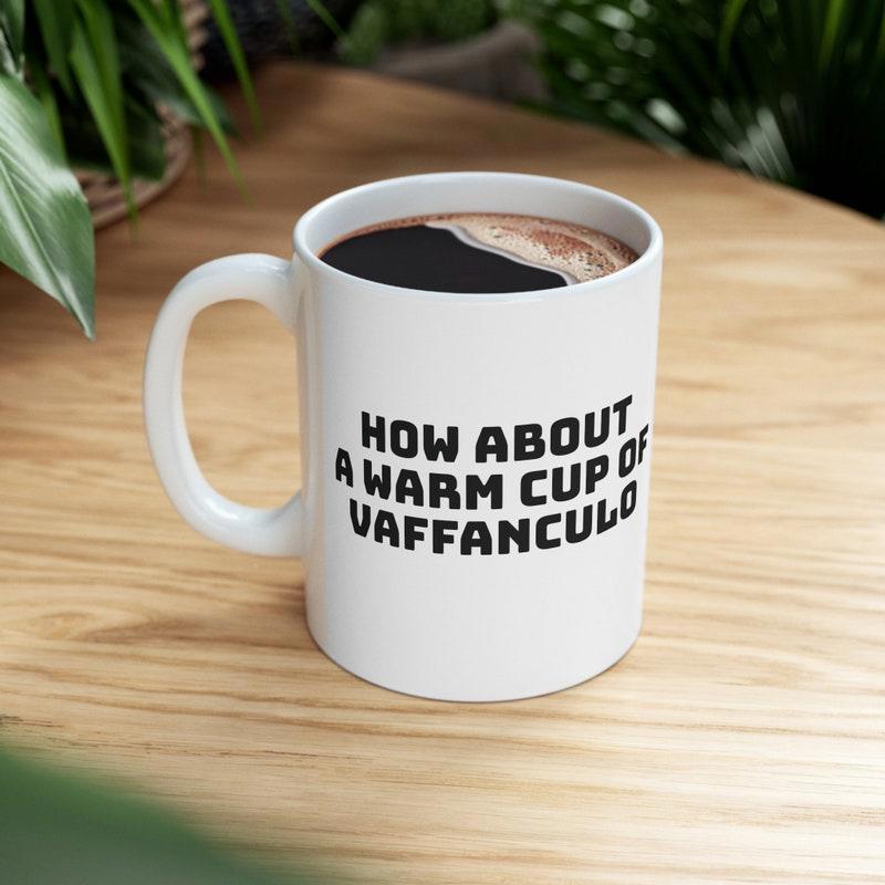 Tailorly White Ceramic 11 oz Mug - How About A Warm Cup Of Vaffanculo Minimalist White Ceramic Container Resting On A Natural Wood Table Mug