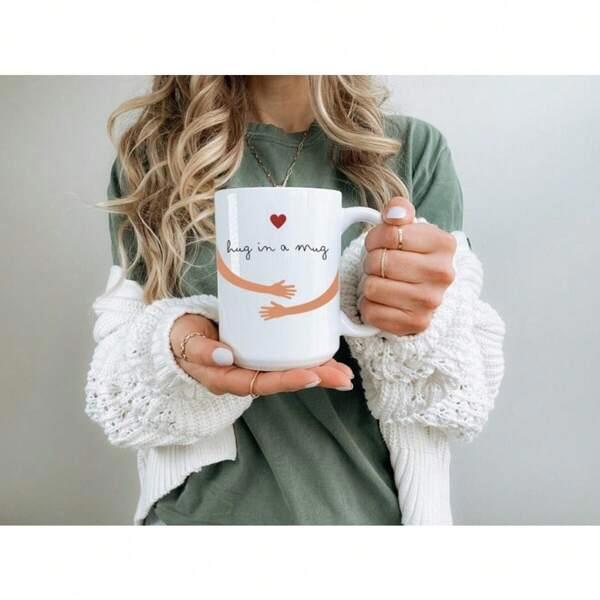 Tailorly White Ceramic 11 oz Mug - Hug In A Mug Illustrative Tanned Arms Embracing A Simple Red Heart On