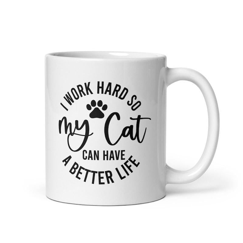 Tailorly White Ceramic 11 oz Mug - I Work Hard So My Cat Can Have A Better Life Minimalist Black Paw Print Centered Within Circular Arranged Inspirational