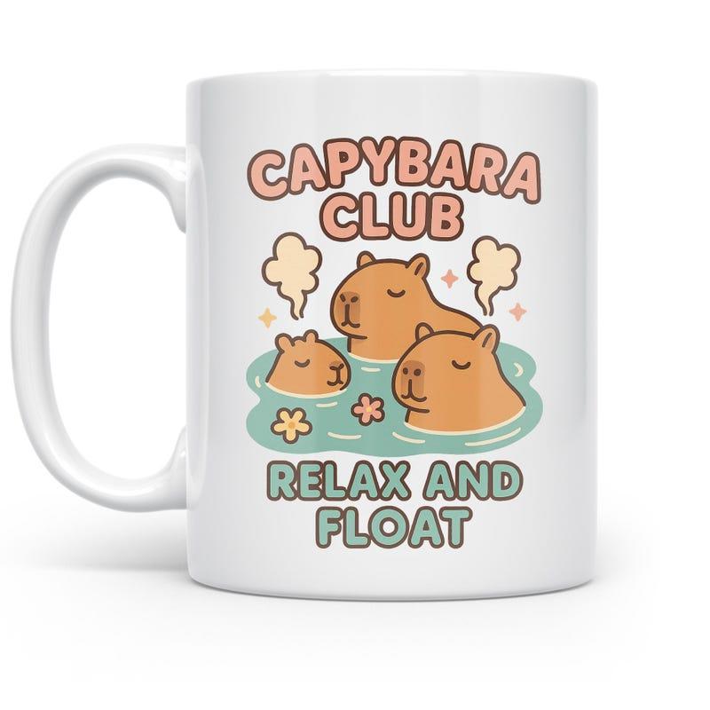 Tailorly White Ceramic 11 oz Mug - Capybara Club Relax And Float Three Cute Cartoon Animals Soaking In Steaming Hot Spring With Flowers Capybara