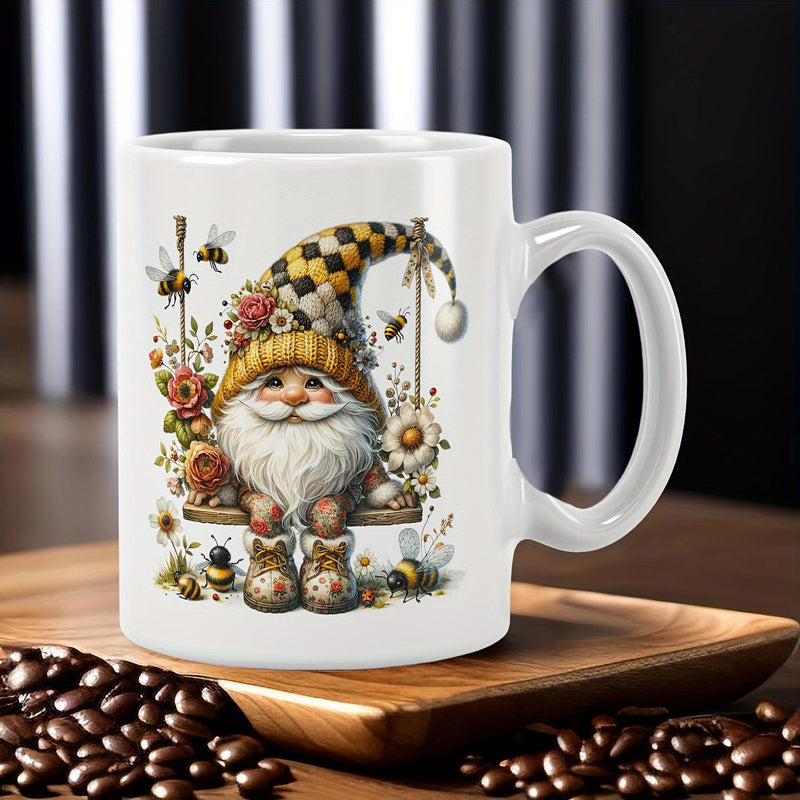 Tailorly White Ceramic 11 oz Mug - Whimsical Garden Dweller Sitting On A Swing Amidst Flowers And Bees Gnome