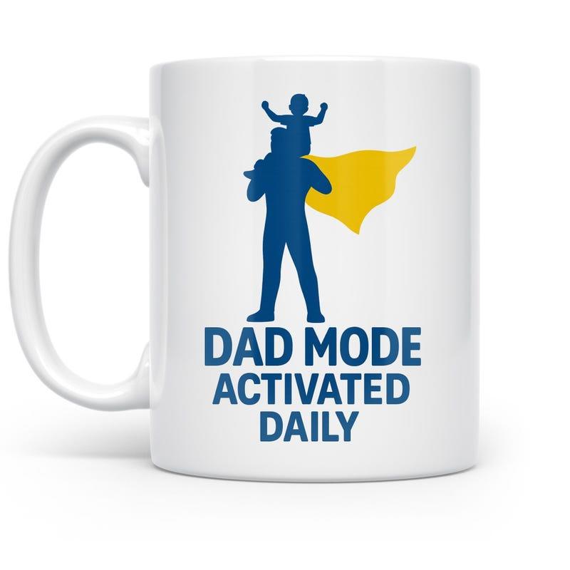 Tailorly White Ceramic 11 oz Mug - Dad Mode Activated Daily Heroic Father Figure Carrying Small Child With Yellow Cape Silhouette