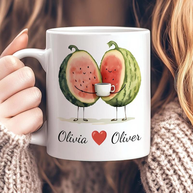 Tailorly White Ceramic 11 oz Mug - Olivia Oliver Two Cute Watermelon Characters Holding A Small White Cup Watermelon