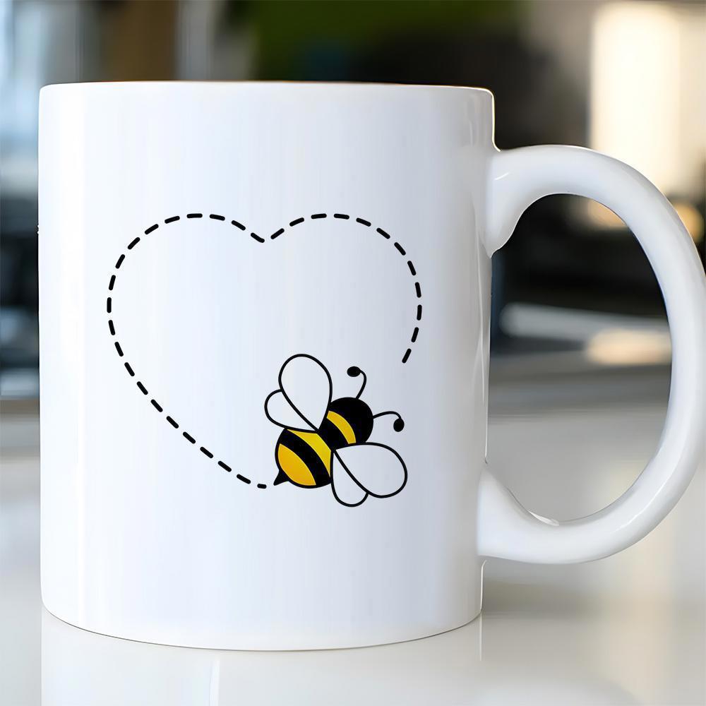 Tailorly White Ceramic 11 oz Mug - Simple Cartoon Honeybee Flying Along A Dotted Heart Shape Trail Bee