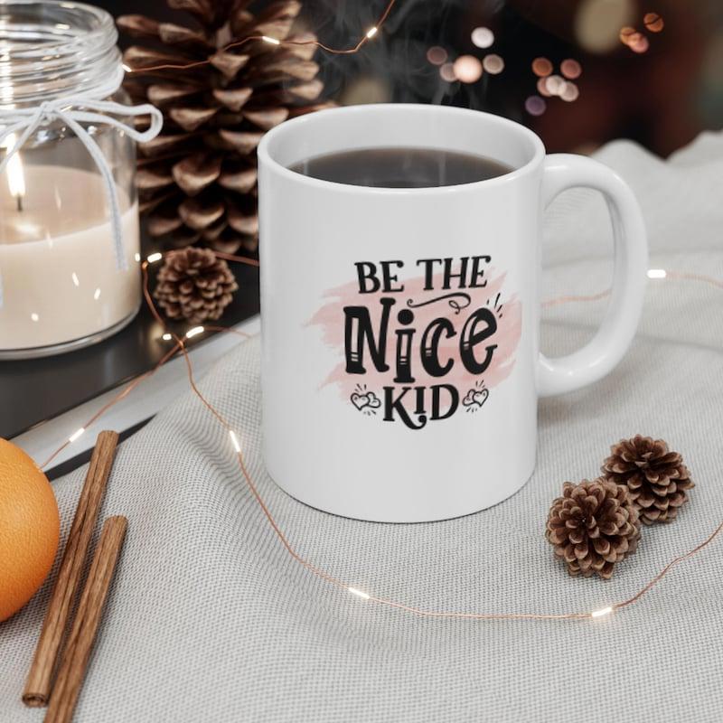 Tailorly White Ceramic 11 oz Mug - Be The Nice Kid Minimalist White Ceramic With Artistic Pink Watercolor Stroke And Heart Swirls Mug
