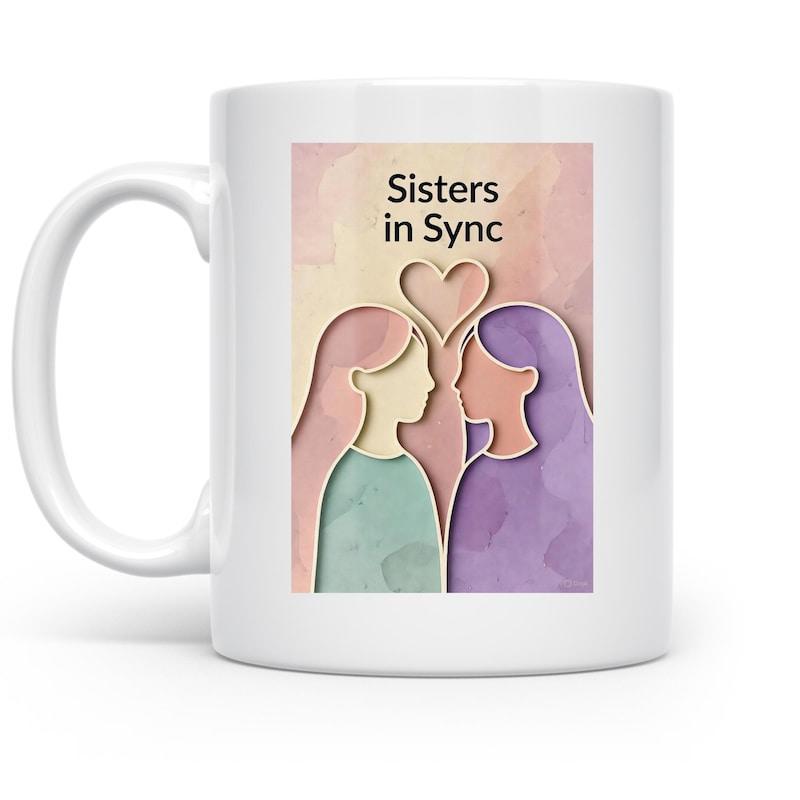 Tailorly White Ceramic 11 oz Mug - Sisters In Sync Two Abstract Female Profiles Facing Each Other With A Glowing Heart Sisters
