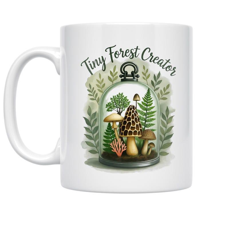 Tailorly White Ceramic 11 oz Mug - Tiny Forest Creator Lush Green Ferns And Earthy Mushrooms Inside A Glass Terrarium Mushroom
