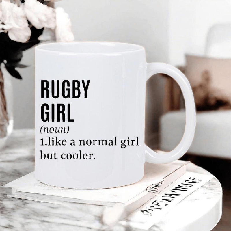 Tailorly White Ceramic 11 oz Mug - Rugby Girl Noun Like A Normal Girl But Cooler Sleek Minimalist White Ceramic Body Resting Quietly On A Marble Table Surface Mug