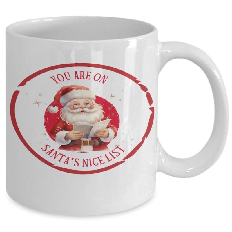Tailorly White Ceramic 11 oz Mug - You Are On Santa's Nice List Festive Jolly Christmas Character Holding Paper Surrounded By Red Circular Border Santa Claus