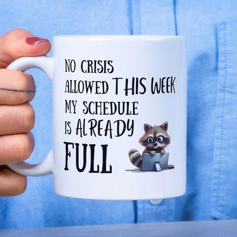 Tailorly White Ceramic 11 oz Mug - No Crisis Allowed This Week My Schedule Is Already Full Adorable Furry Raccoon Busy Working On A Small Blue Laptop Raccoon