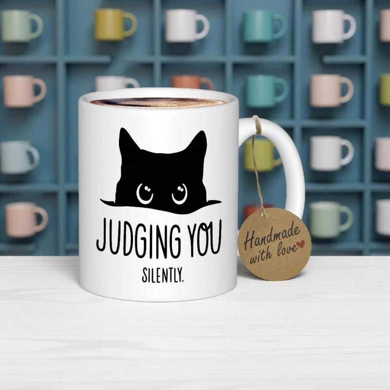 Tailorly White Ceramic 11 oz Mug - Judging You Silently Minimalist Black Silhouette Peeking Over Horizontal Ledge With Expressive Eyes Cat