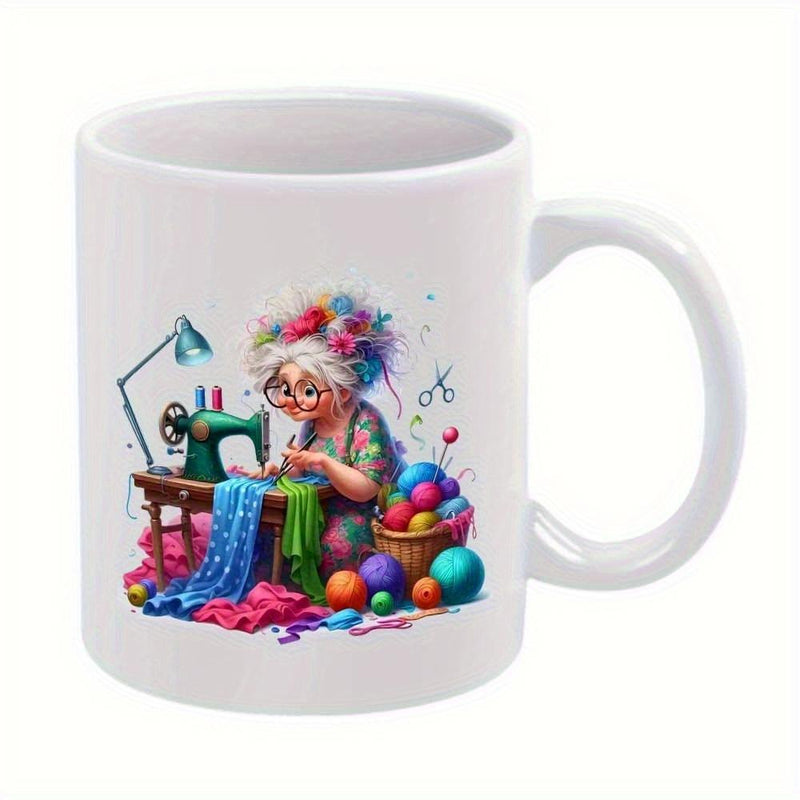 Tailorly White Ceramic 11 oz Mug - Whimsical Elderly Woman Working On Sewing Machine Surrounded By Colorful Yarn Seamstress