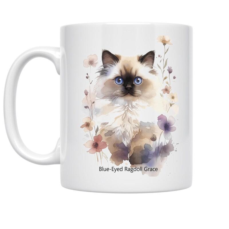 Tailorly White Ceramic 11 oz Mug - Blue Eyed Ragdoll Grace Soft Watercolor Feline Sitting Among Delicate Pastel Blooming Garden Cat