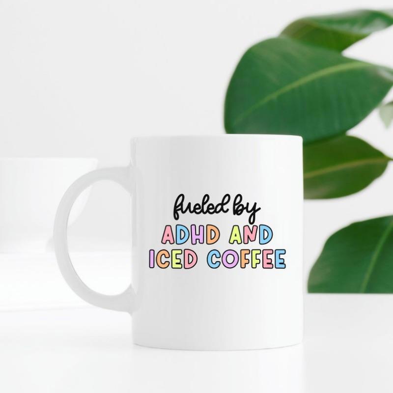Tailorly White Ceramic 11 oz Mug - Fueled By ADHD And Iced Coffee Vibrant Rainbow Colored Bubble Letters Printed On A Ceramic