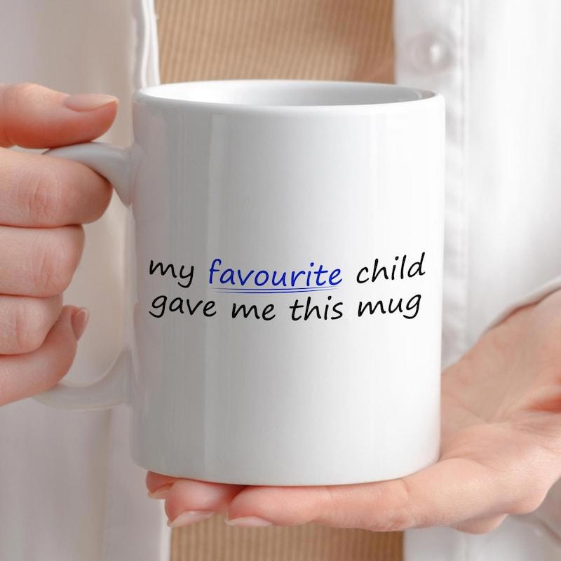Tailorly White Ceramic 11 oz Mug - My Favourite Child Gave Me This Mug Simple White Ceramic Kitchenware Held By Hands Mug