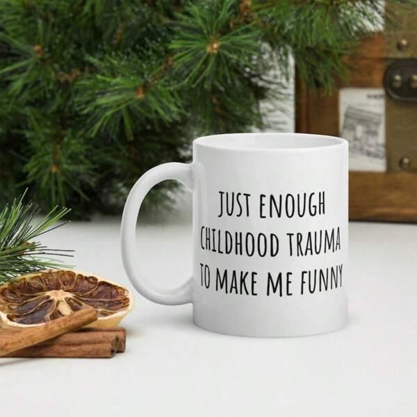 Tailorly White Ceramic 11 oz Mug - Just Enough Childhood Trauma To Make Me Funny Minimalist White Ceramic Drinking Vessel Resting In Natural Decor Mug