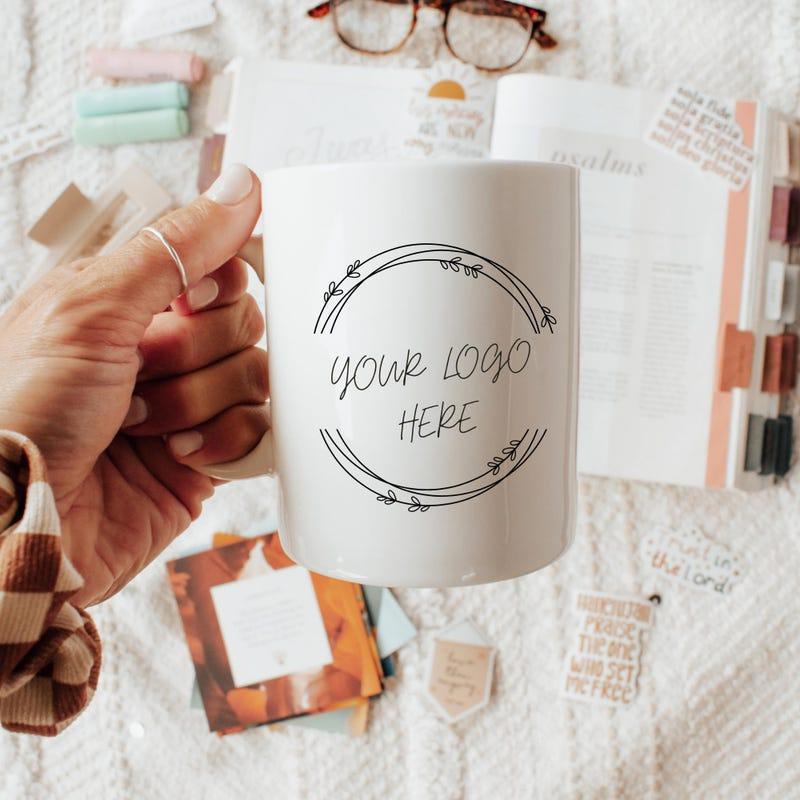 Tailorly White Ceramic 11 oz Mug - Your Logo Here Minimalist Circular Hand Drawn Wreath Border Displayed On A Smooth Ceramic Mug