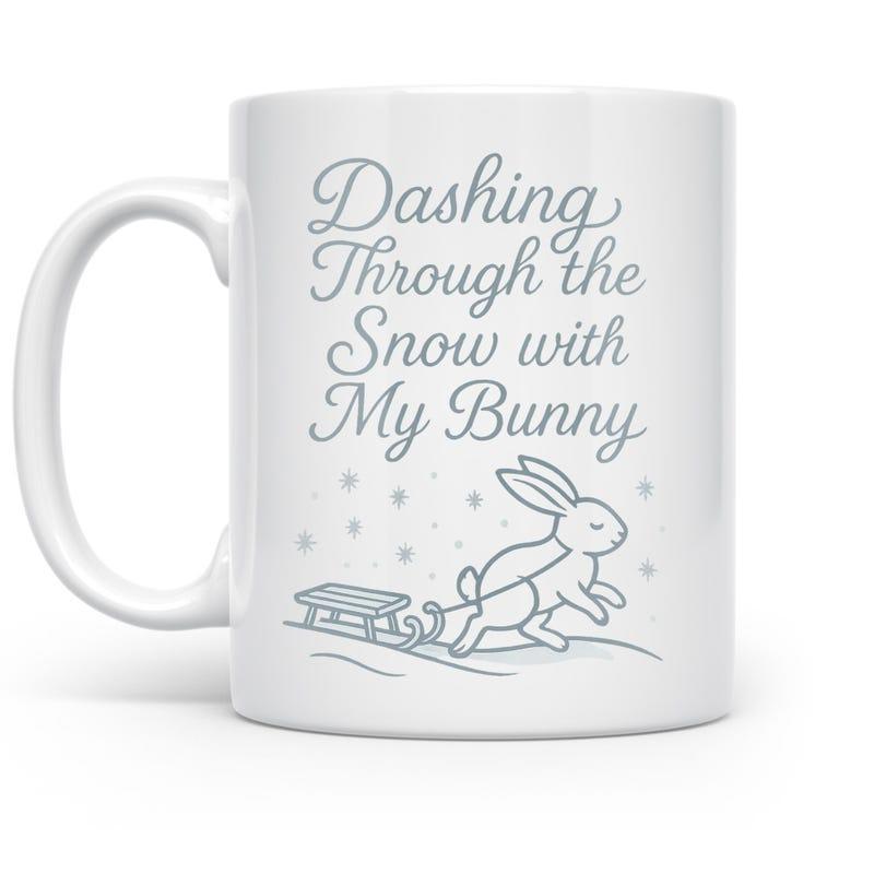 Tailorly White Ceramic 11 oz Mug - Dashing Through The Snow With My Bunny Simple Line Drawing Pulling A Sled Across Cold Winter Snowy Hills Rabbit
