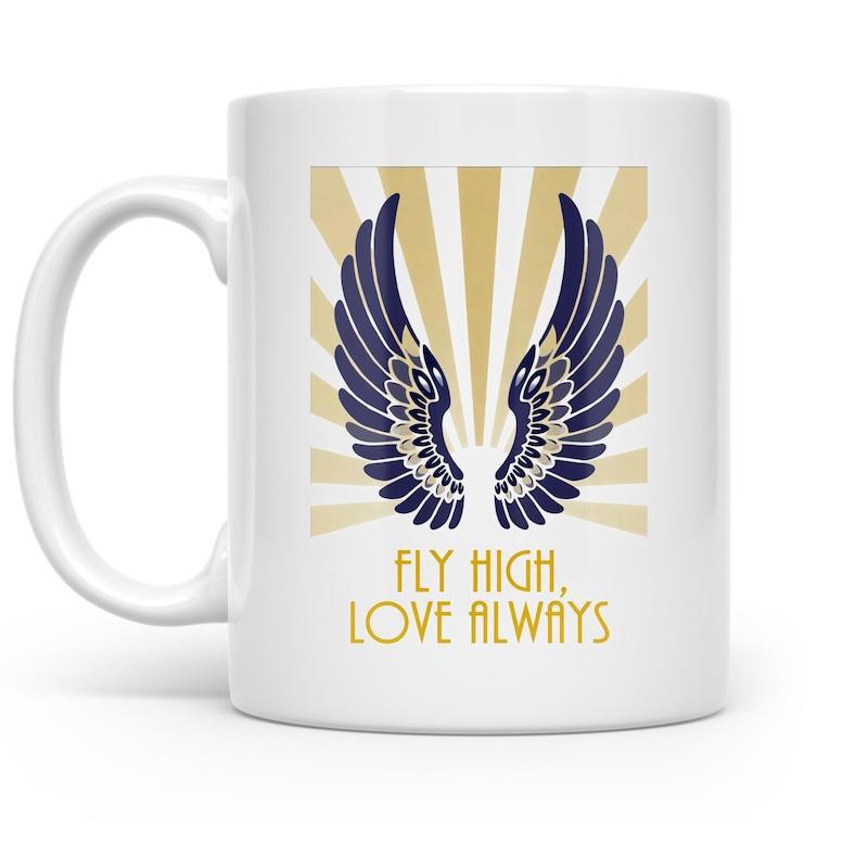 Tailorly White Ceramic 11 oz Mug - Fly High Love Always Majestic Symmetrical Blue Feathers With Golden Radiant Sunburst Rays Wings
