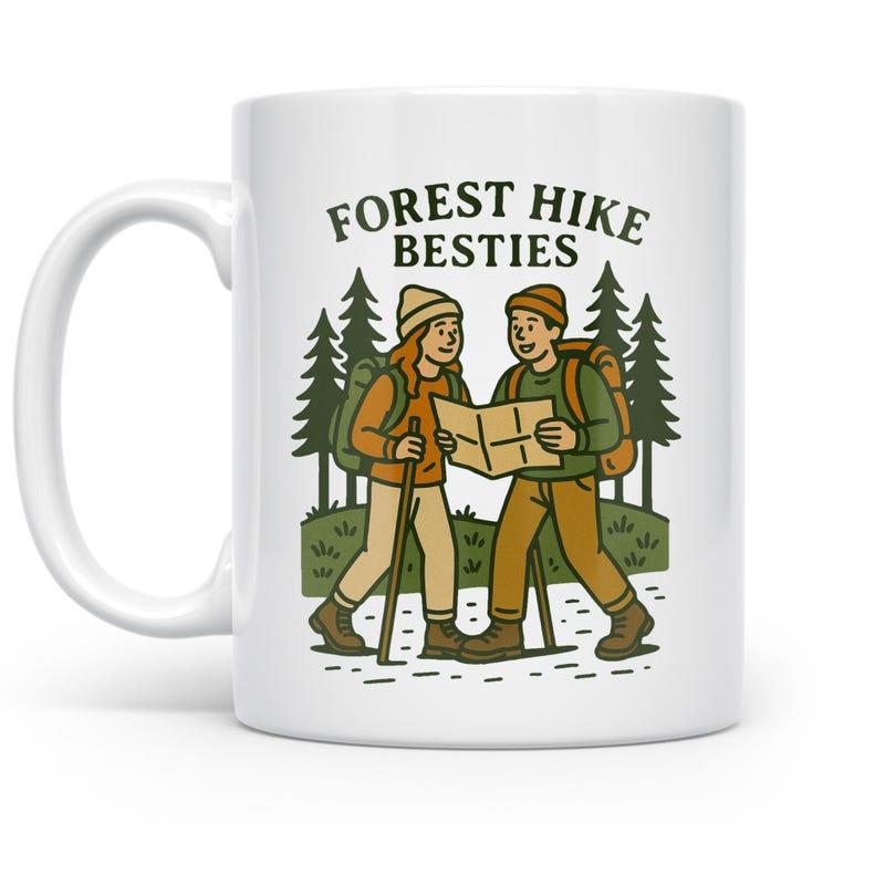 Tailorly White Ceramic 11 oz Mug - Forest Hike Besties Happy Friends Exploring Mountain Trails Among Tall Evergreens Carrying Camping Gear Hikers