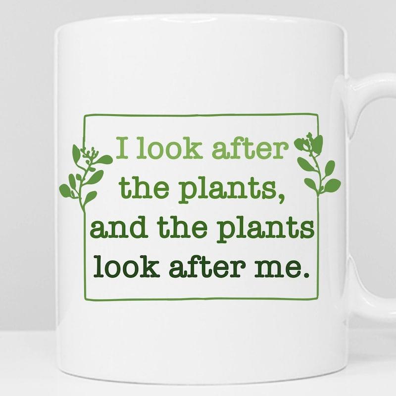 Tailorly White Ceramic 11 oz Mug - I Look After The Plants And The Plants Look After Me Simple Green Leaf Sprigs Enclosed Within A Minimalist Hand Drawn Border