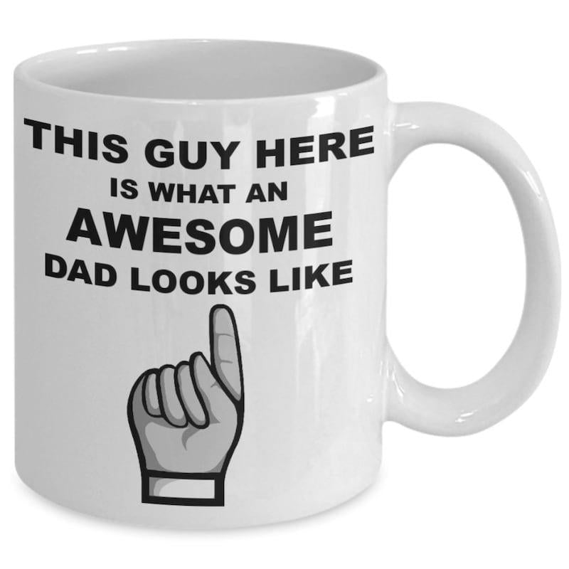 Tailorly White Ceramic 11 oz Mug - This Guy Here Is What An Awesome Dad Looks Like Simple Black Line Drawing Of A Hand With Pointing Finger Hand