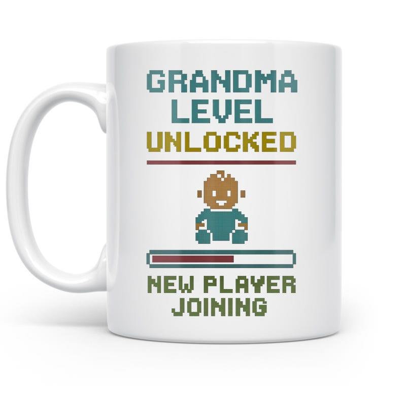 Tailorly White Ceramic 11 oz Mug - Grandma Level Unlocked New Player Joining Retro Digital Gaming Aesthetic Featuring Pixelated Character And Loading Status Bar