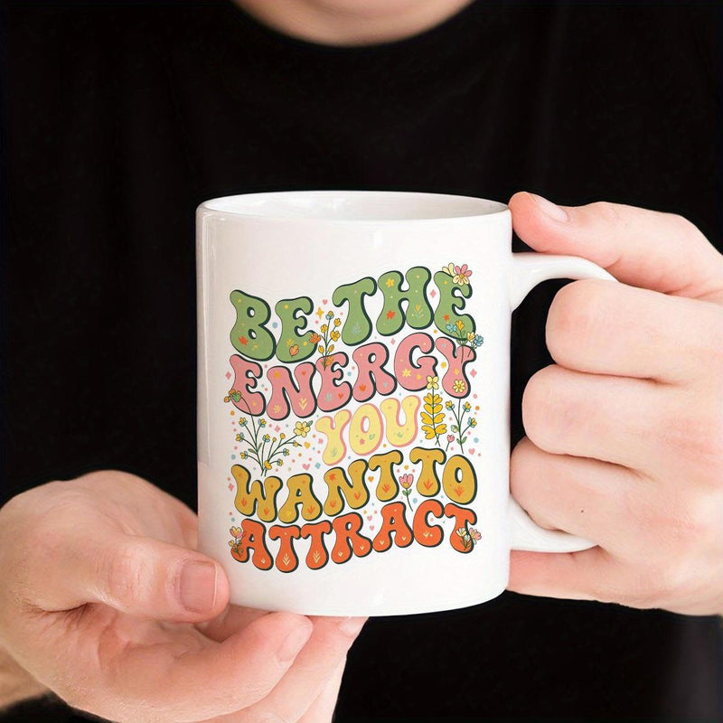 Tailorly White Ceramic 11 oz Mug - Be The Energy You Want To Attract Retro Styled Colorful Groovy Lettering Among Delicate Floral Accents Ceramic Mug