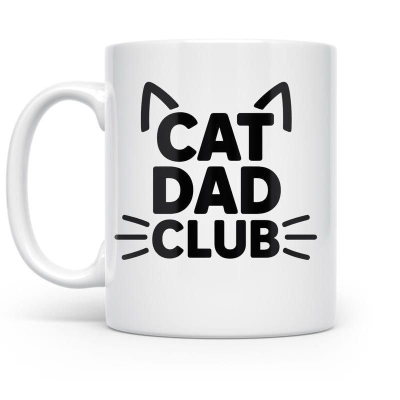 Tailorly White Ceramic 11 oz Mug - Cat Dad Club Minimalist Black Ink Lines Depicting Feline Ears And Whiskers Silhouette Cat