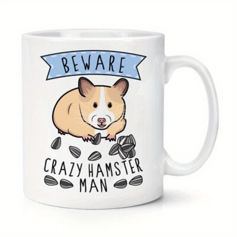 Tailorly White Ceramic 11 oz Mug - Beware Crazy Hamster Man Adorable Cartoon Hamster With Sunflower Seeds Eating Under A Blue Banner Hamster