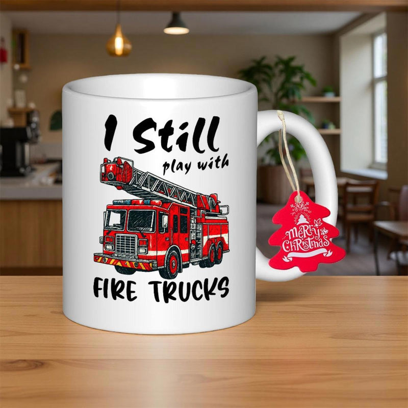 Tailorly White Ceramic 11 oz Mug - I Still Play With Fire Trucks Detailed Red Emergency Rescue Vehicle With Long Ladder On White Surface Fire Truck