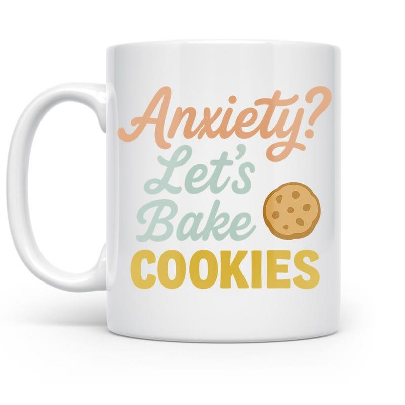 Tailorly White Ceramic 11 oz Mug - Anxiety Lets Bake Cookies Simple Circular Brown Chocolate Chip Snack Floating Beside Colorful Stylized Text Cookie