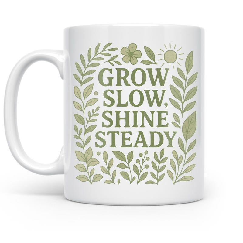Tailorly White Ceramic 11 oz Mug - Grow Slow Shine Steady Botanical Leaves With Small Flower And Sun Rays Wreath