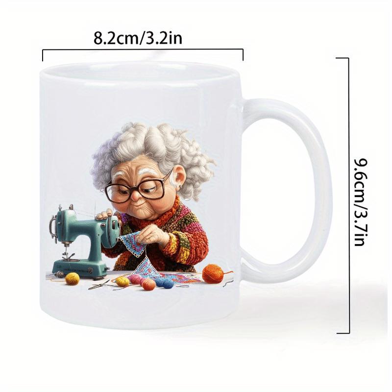 Tailorly White Ceramic 11 oz Mug - Elderly Woman With Grey Curls Sewing Carefully At Vintage Green Machine Grandmother